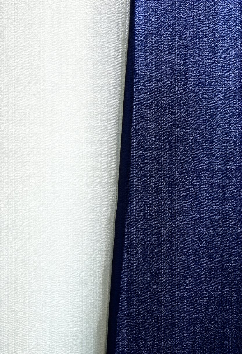 Lustrous mulberry silk fabric swatch displaying rich drape and natural sheen under soft studio light